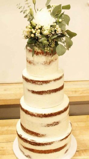 semi naked wedding cake calamigos